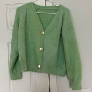 fluffy green cardigan